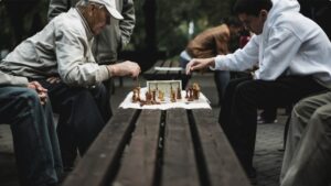 A man concentrates over a chessboard at ChessFest London in Trafalgar Square