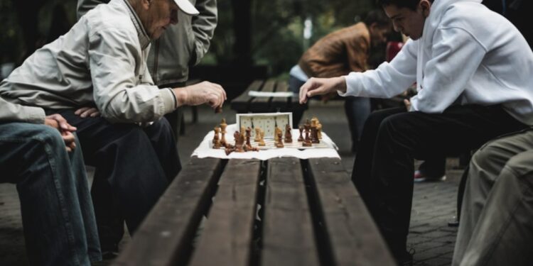 Screenshot_2026-07-14_002931 - LONDONwebzine A man concentrates over a chessboard at ChessFest London in Trafalgar Square