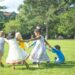 children-running-in-park-summer-unsplash - LONDONwebzine children running through a green Royal Park in London, enjoying free outdoor activities for London kids during the summer.