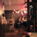 woman-dining-luxury-london-restaurant-unsplash - LONDONwebzine A woman enjoying exclusive dining at one of London's top members clubs, surrounded by elegant interiors