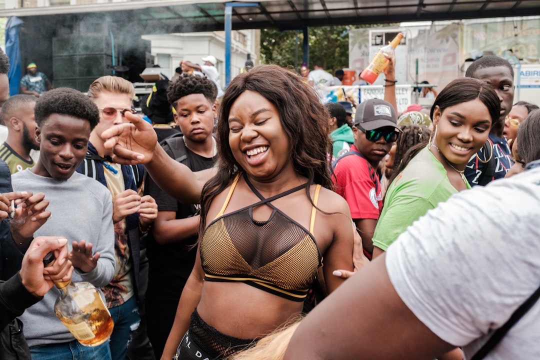 A group of friends enjoying a live music performance during a bank holiday weekend festival in London