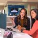 professional-mentor-advising-entrepreneur-office-unsplash - LONDONwebzine An experienced business mentor in London reviews a startup plan with a young founder at a desk
