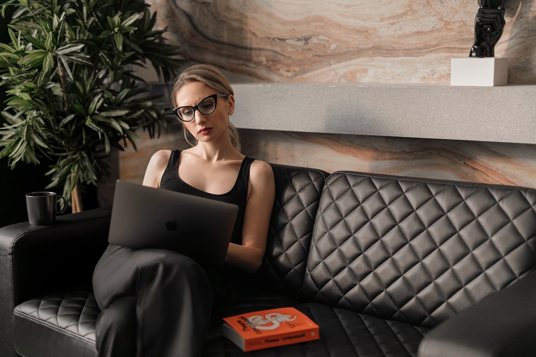 A London SME founder completes a business audit checklist on her laptop to ensure VAT and compliance are in order for Q4.