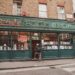 A woman carefully browses shelves inside one of London's independent bookshops on a summer afternoon