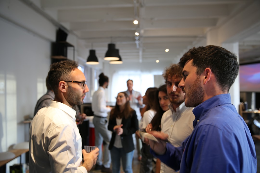 Two founders networking at a London autumn accelerator investor event in the City