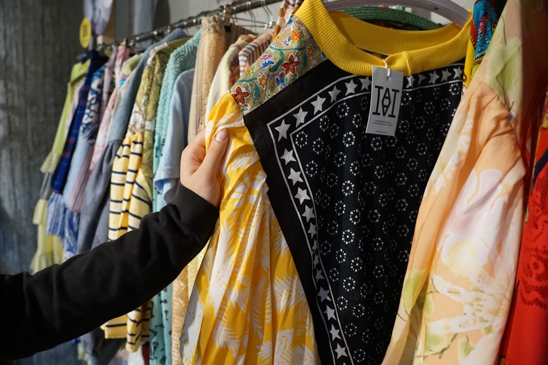 A young woman browses a slow-fashion boutique in London, inspired by the sustainable fashion labels featured at London.