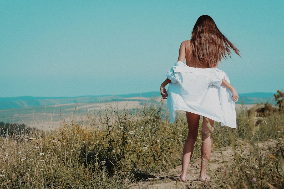 Person wrapped in a towel after a cold plunge session in Hackney