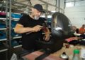Repair cafes in London fix dont bin photo 1 - LONDONwebzine Volunteer fixer at a London repair cafes session mending a small appliance
