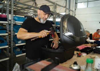 Repair cafes in London fix dont bin photo 1 - LONDONwebzine Volunteer fixer at a London repair cafes session mending a small appliance
