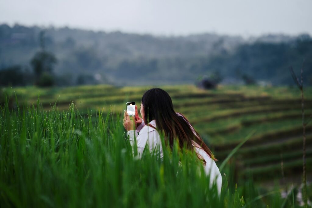A London traveller exploring rice terraces in Bali, one of the most popular long-haul destinations for Londoners in autumn
